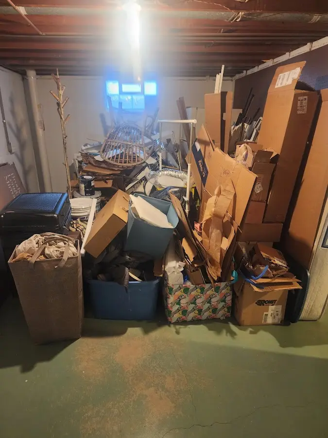 Roll-off dumpster container at job site for Yard Waste Dumpster Rental in Hermon